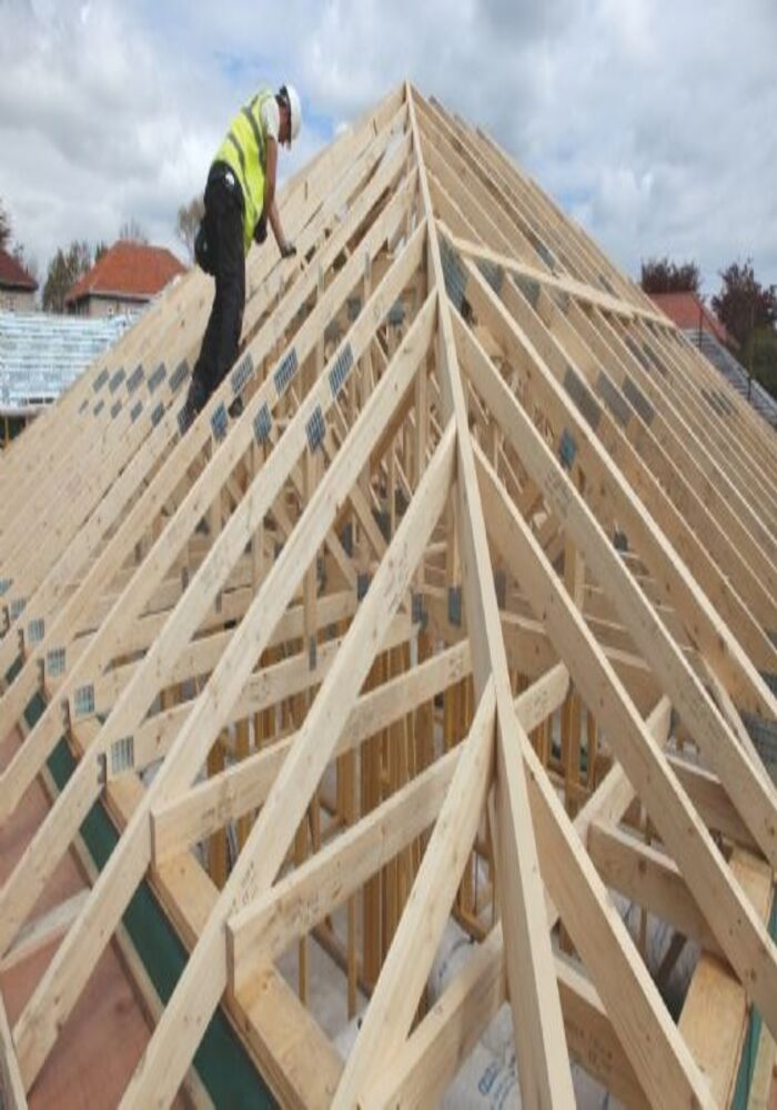New timber roof truss structure being installed - All Aspects Construction