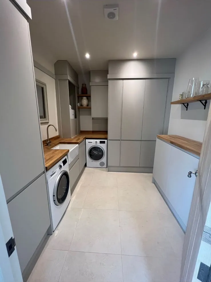 Utility room we fitted with grey shaker units, a solid oak worktop and space for the washer and dryer