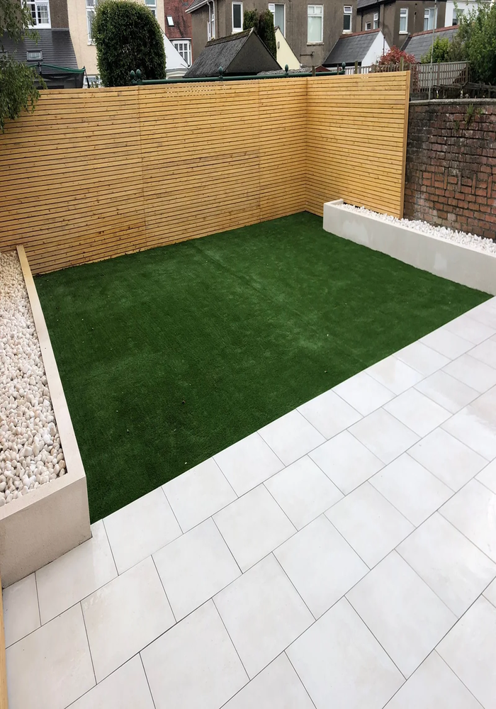 Garden with artificial lawn and porcelain paving — Cardiff & Caerphilly Construction