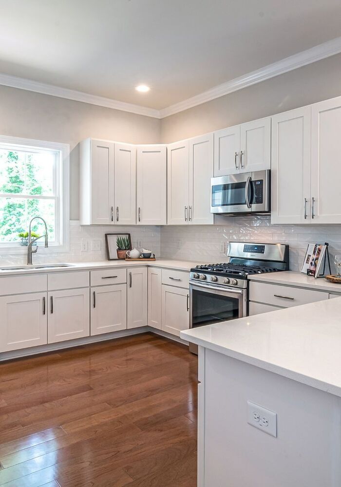 Modern white fitted kitchen — Cardiff & Caerphilly Construction