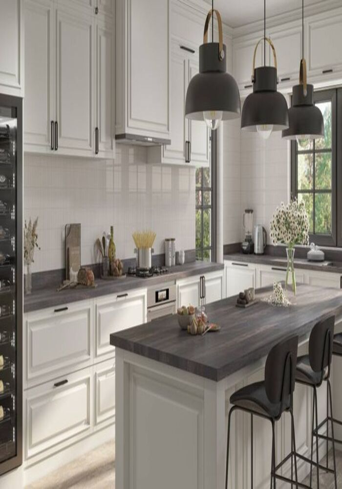 Modern dark fitted kitchen with pendant lighting — Cardiff & Caerphilly Construction