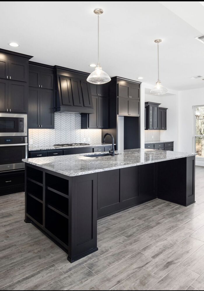Contemporary black kitchen with island — Cardiff & Caerphilly Construction
