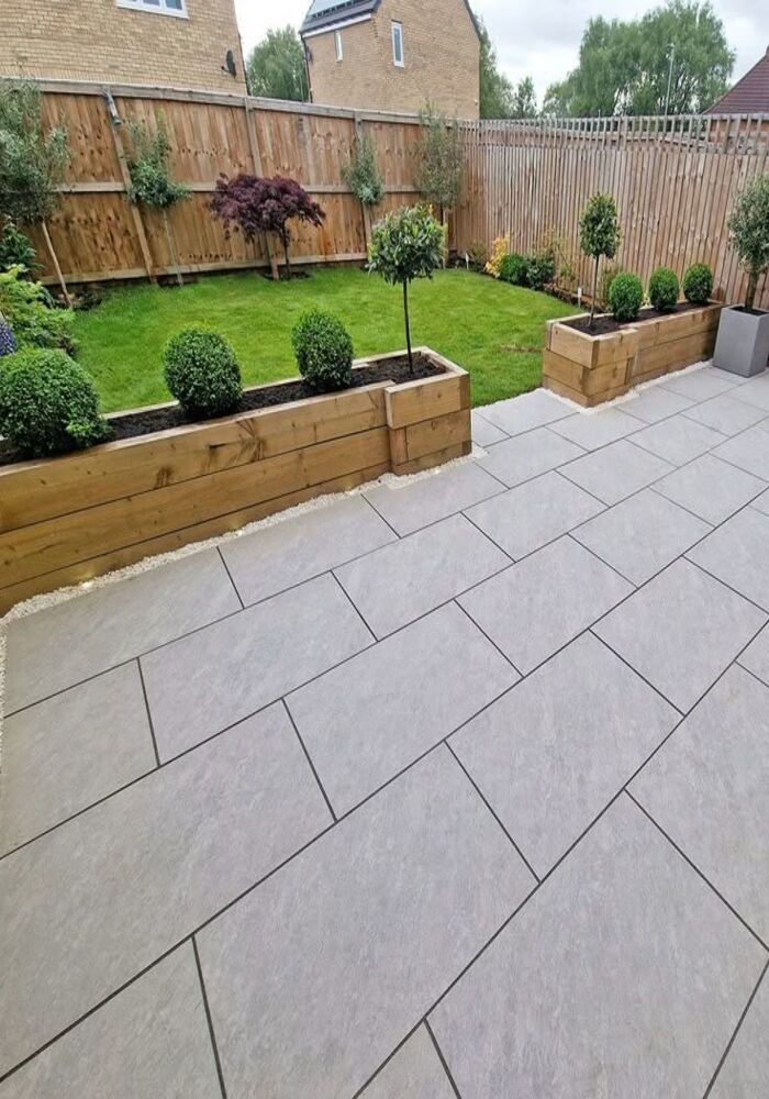 Landscaped garden with raised beds and paving — Cardiff & Caerphilly Construction
